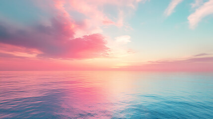 Obraz premium Dreamy pastel hues drift across calm ocean horizon under soft sky, creating serene and peaceful sunset atmosphere