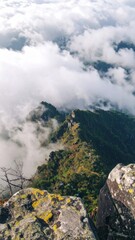 Green Mountainous Landscape Under White Overcast Clouds and Foggy Weather