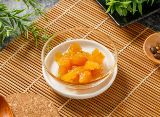 Sweetened Pineapple Chunks in Glass Bowl side view of hong kong food