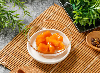 Sweet Potato Chunks in Glass Bowl on Bamboo Mat side view of hong kong food