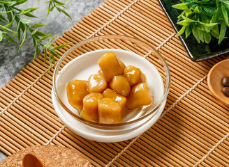 Sweet Taro Balls in Glass Bowl on Bamboo Mat side view of hong kong food