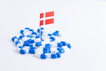 Tablets and the flag of Denmark. Import of tablets to Denmark.