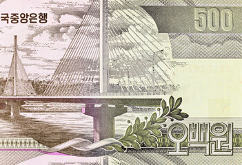 500 Won North Korea banknote with the image of Chongryu Bridge over Taedong River, Pyongyang. North Korean paper money.