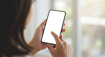 Woman hand holding using touch mobile phone white screen mockup Back view
