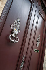 Elegant door knocker on a facade