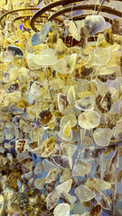 This oneofakind hanging shell decor beautifully showcases vibrant sea glass combined with an iridescent texture, making it an ideal choice for elevating coastal and beachthemed interior designs