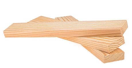 Group of pine planks isolated on a white background. Wooden boards in woodworking industry. Pine wooden bars.