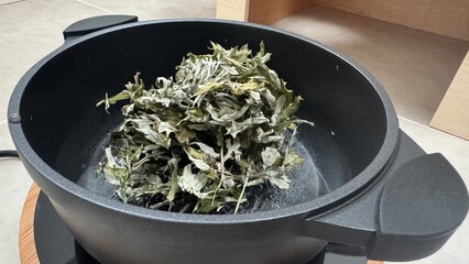 frying pan with spinach
