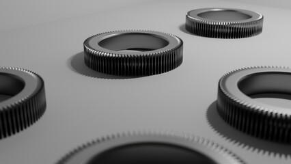 Gears rest on the clean white surface