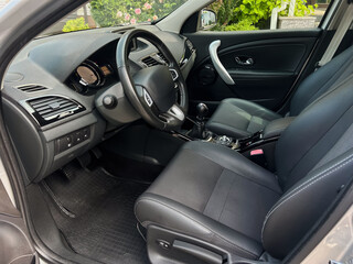 Experience a stylish and modern car interior featuring luxurious leather seats, a sleek design, and a contemporary dashboard that enhances elegance and comfort for all your transportation needs