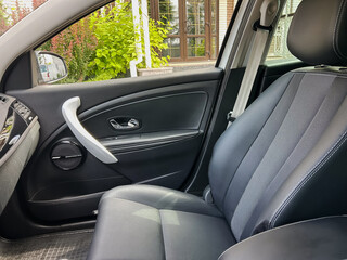 Experience the stylish and modern interior of a compact car, featuring comfortable seating...