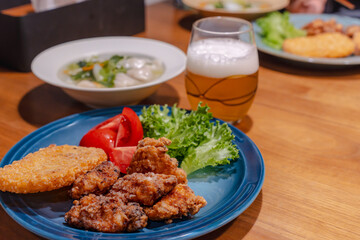 Homemade Dinner with Fried Chicken, Dumpling Soup and Beer / 唐揚げと餃子スープとビールの夕食
