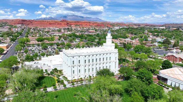 Aerial St George Utah Temple Arc Shot Over City and Red Rock Landscape