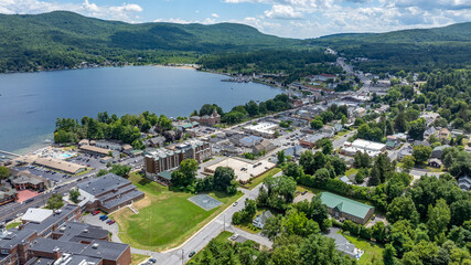 July 21, 2025 - Lake George, NY, USA.  Sunny afternoon summer aerial image of the south end of Lake George and Canada Street, Lake George, NY, USA.
