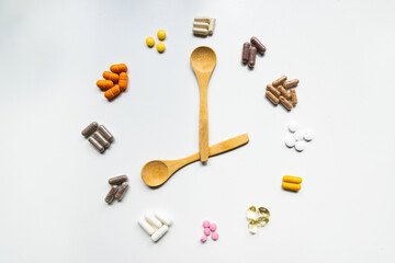 taking pills vitamins or supplements conceptual image