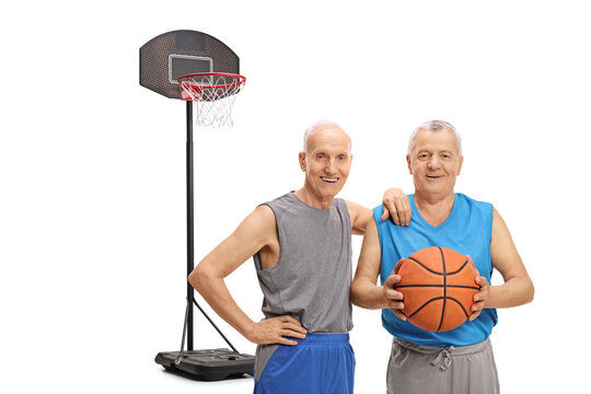 Elderly men in sportswear with a basketball - Powered by Adobe