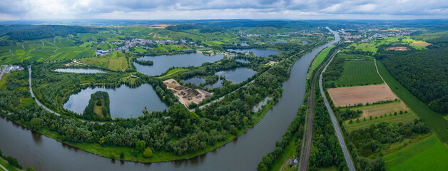 Aerial view of the village Remerschen and the river Mosel in Germany on a sunny spring day