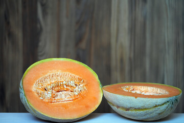 melon on a wooden table