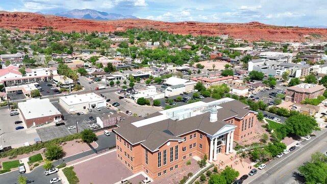 Aerial Downtown St George Utah Tracking Shot Over Civic Buildings and Red Rocks