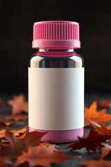 Blank Pink Bottle Mockup with Autumn Leaves
