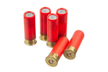 Six red 12-gauge shotgun shells, some standing upright and some lying down, on a white back