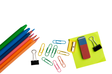 Colorful school supplies including pencils paperclips sharpener and eraser arranged at the bottom with copy space on white, png isolated. 