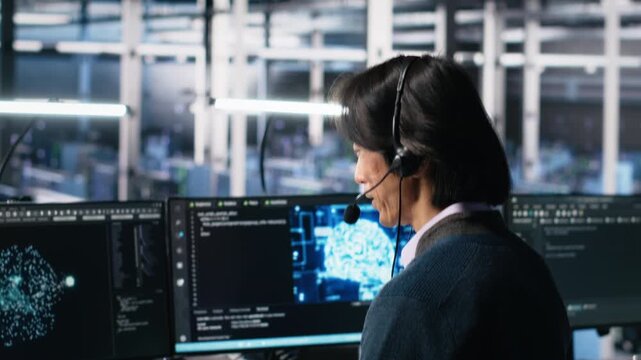 Data center system administrator using AI assistant to provide user technical support. Server room IT specialist managing live support calls assisted by artificial intelligence LLM, camera A