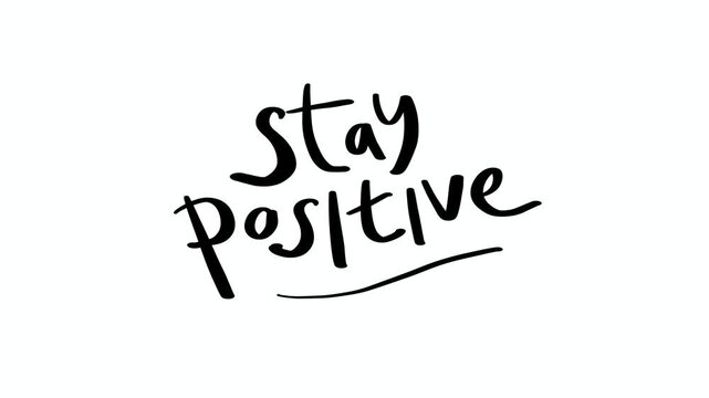Handwritten inspirational phrase reading 'Stay Positive,' conveying motivation, encouragement, and optimism on a clean white backdrop.
