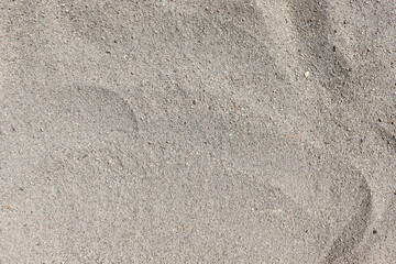 Close-up of coarse beach sand texture