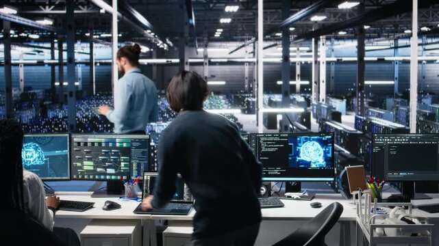 Programmer entering server room office, using AI to review infrastructure diagnostics. IT admin in data center high tech facility analyzes performance data using artificial intelligence tech, camera A
