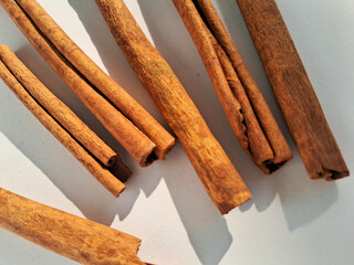 cinnamon sticks on a white background