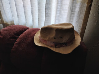 Old hat on a chair