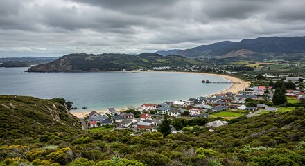a view of a small town by the ocean