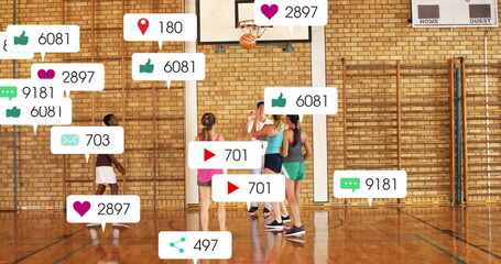 Practicing basketball five athletes wearing sportswear at school gym with social media icons and h