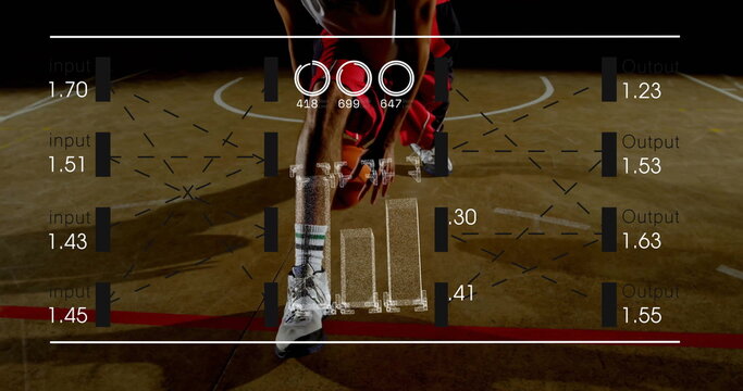 Dribbling red uniform basketball player holding low stance on wood court, with digital metrics