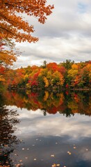 Autumn foliage reflected in calm water
