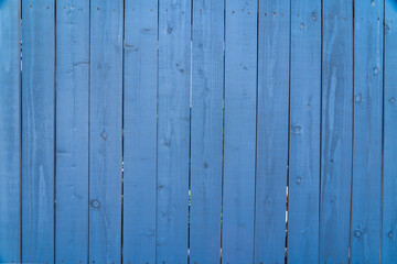 Blue wooden fence close up
