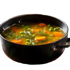 Delicious homemade vegetable soup with carrots, peas and dill in a black pot