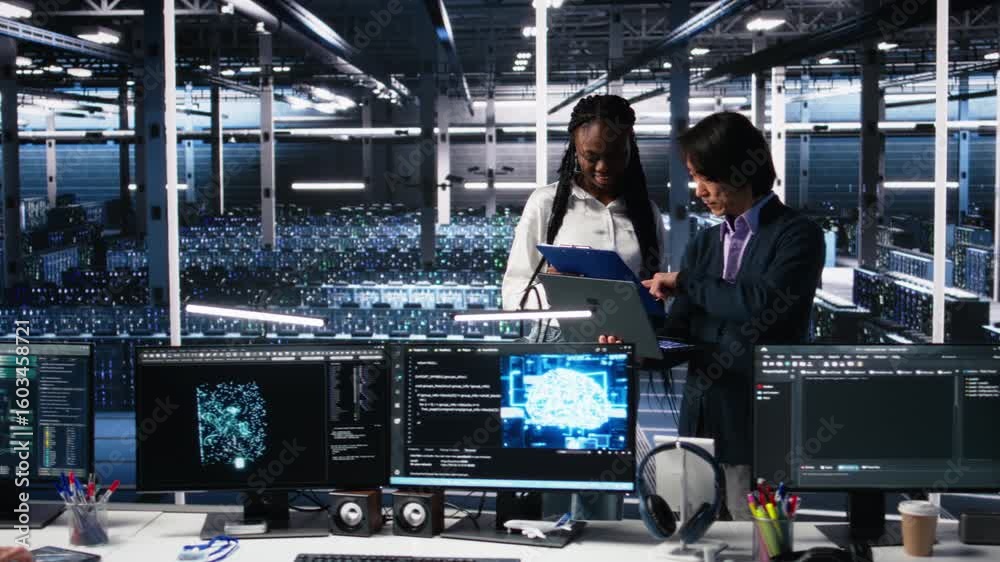 Poster team of data center engineers looking over paperwork and using deep learning algorithms to analyze d