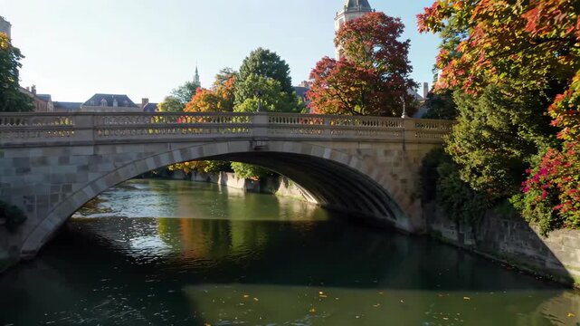 Colorful tree landscape by the river Stonebridge Bridge over the Seine in Paris