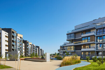 New modern block of flats in green area. residential apartment with flat buildings exterior. luxury house complex. Part of City Real estate property, condo architecture. apartment insurance concept