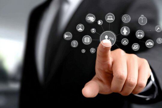 Businessman touching virtual interface with icons representing technology digital icons connection data online communication and innovation