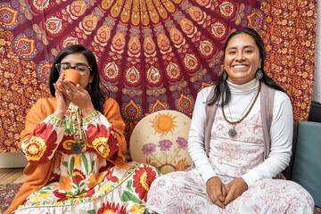 Women drinking organic cocoa during ceremony for alternative medicine and healthy living