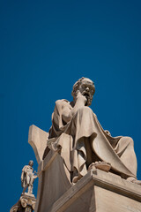 Fototapeta premium Statue of man sitting Greece