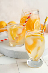 Fototapeta premium Glasses of infused water with lemon on table