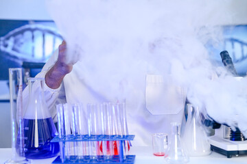 A dedicated Indian researcher analyzes a biological sample in a lab, contributing to medical...