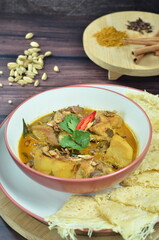 Lamb curry with bread roti jala, indonesian food