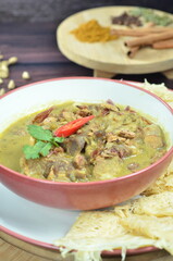 Lamb curry with bread roti jala, indonesian food