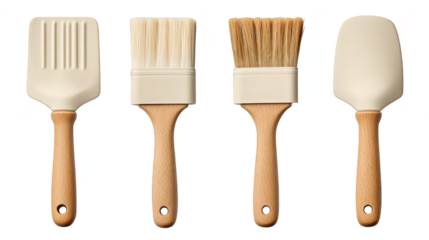 Wooden spatulas and whisk, essential kitchen tools for cooking baking enthusiasts.