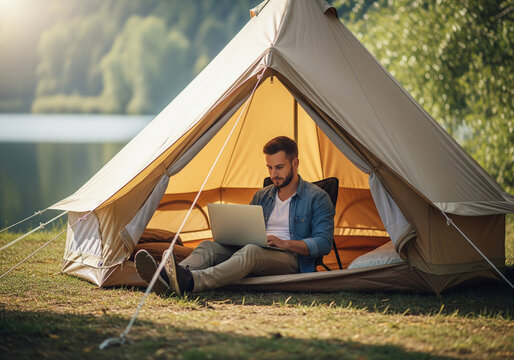 Remote Worker with Portable Monitor in Tent by the Lake &ndash; Digital Nomad Camping Setup, Nature Retreat Vibes, Tech in the Wild, Digital Detox with Portable Workspace in Scenic Outdoors


